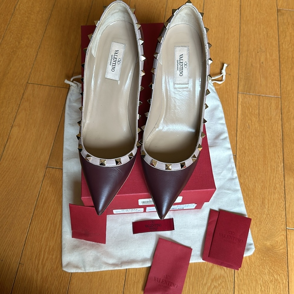 Authentic Valentino Garavani burgundy leather pumps.